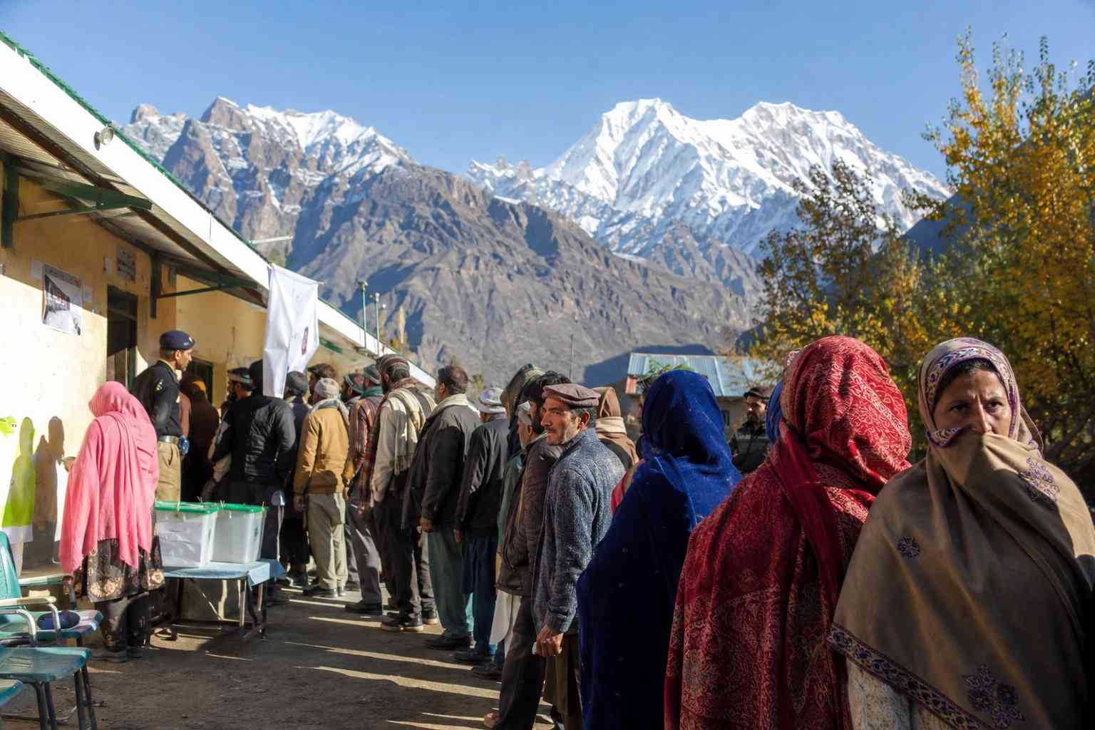 Voters waiting outside a polling station during the Gilgit-Baltistan election.