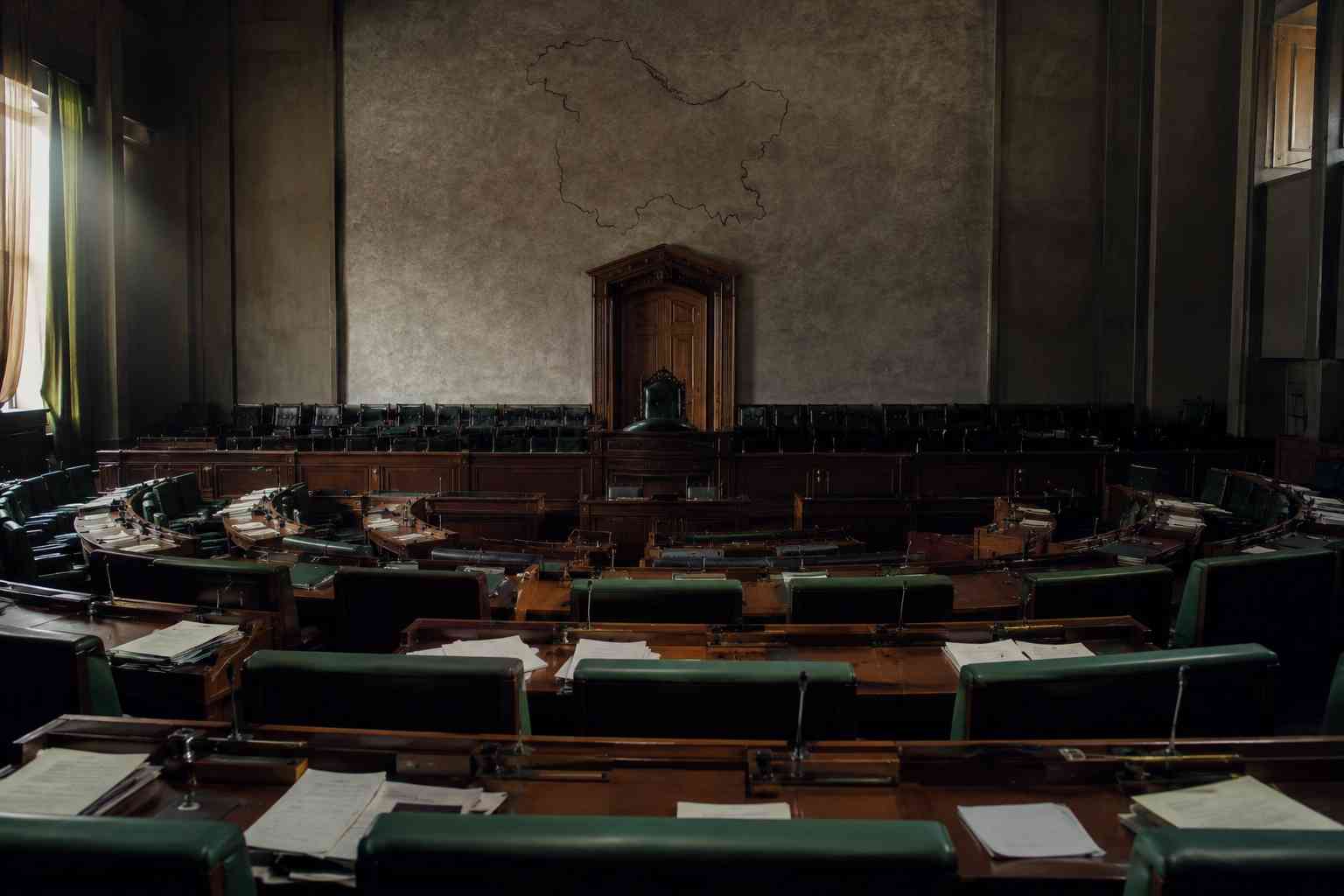 Pakistan-administered Kashmir crackdown reflected through an empty legislative assembly chamber with vacant seats