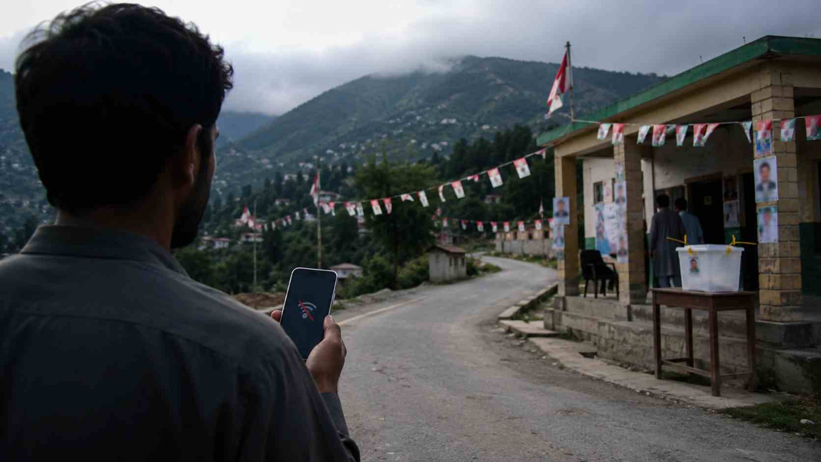 AJK internet shutdown shown through a voter holding a no-signal phone near a polling station