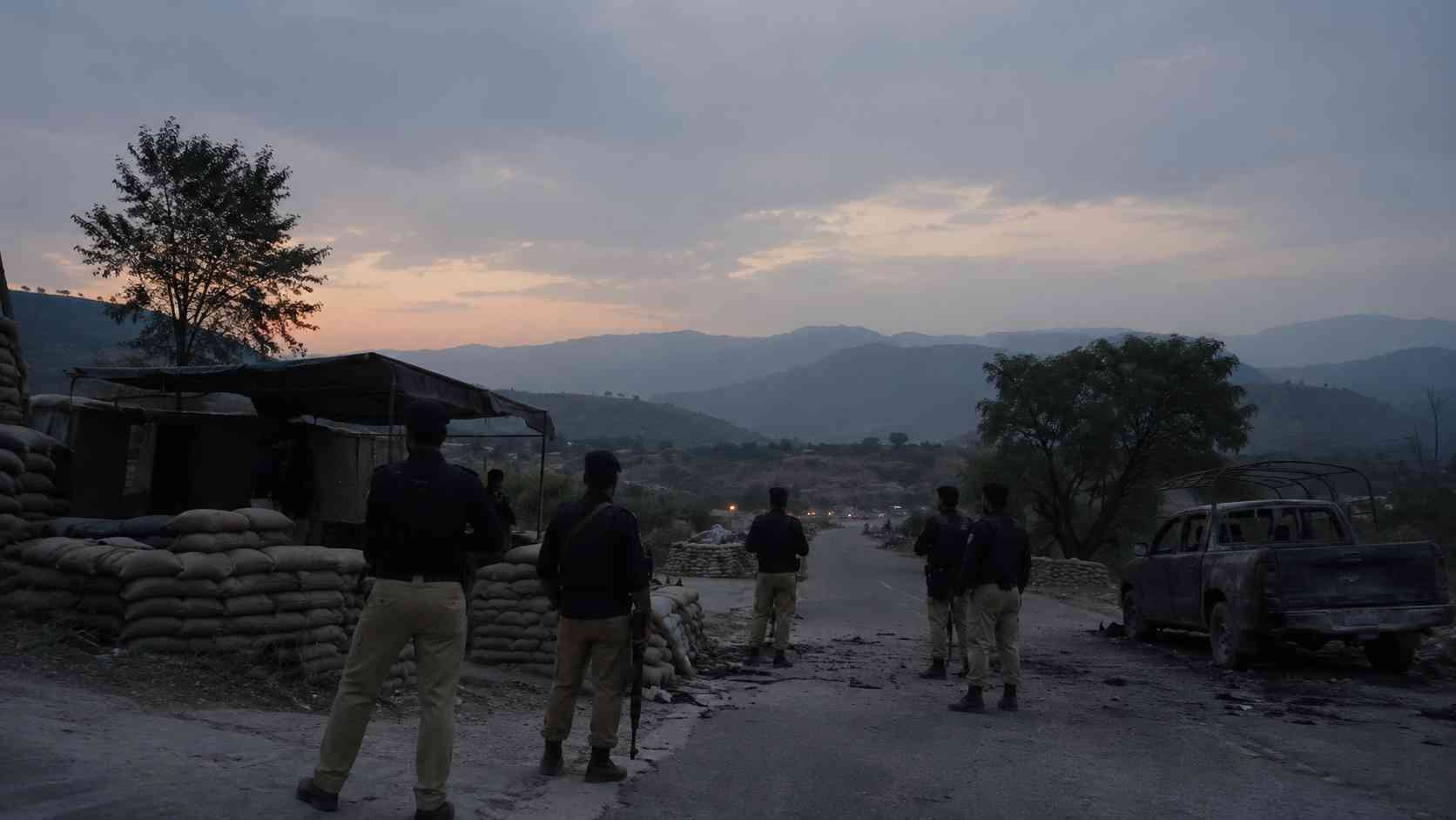 Hangu police post attack scene showing KP police near a rural checkpoint